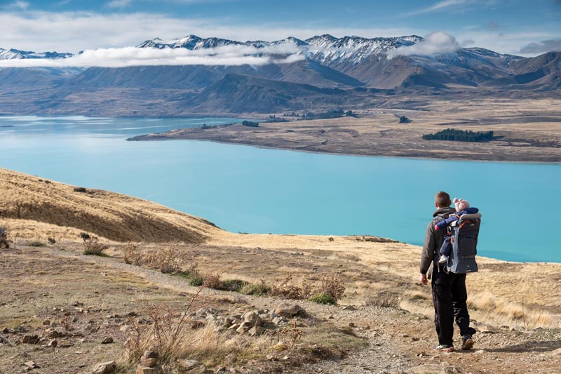 Ashley and Emilia from Backyard Travel Family check out the 360 degree views of Lake Tekapo, Mackenzie Region, Canterbury Walk, South Island, New Zealand