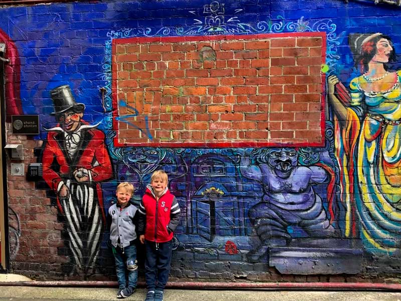 Nathan and Kipton from Backyard Travel Family checks out the Street Art in Wellington City