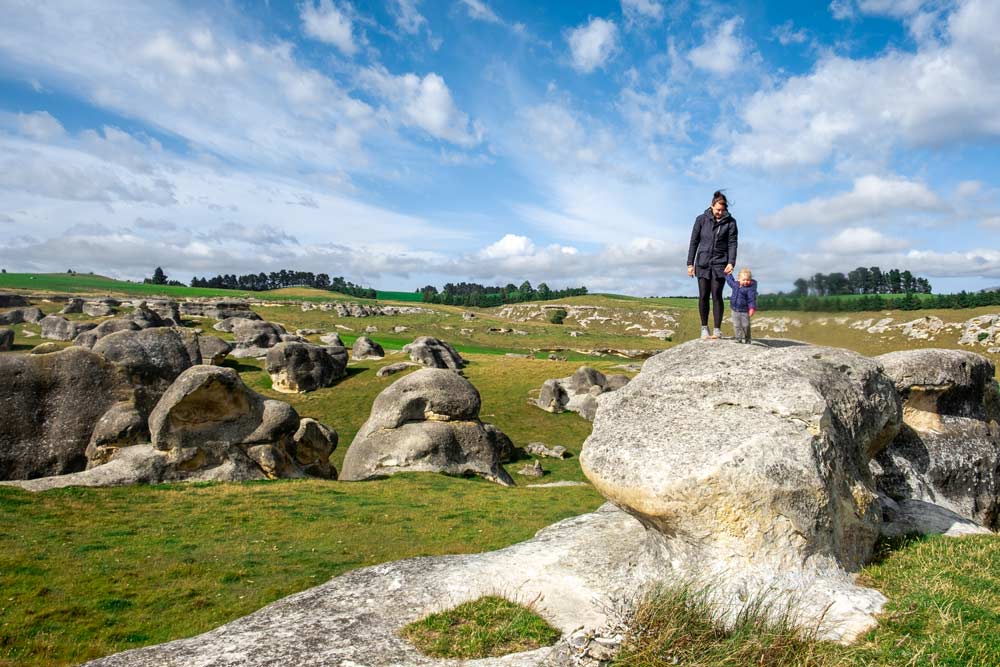 Jen and Emilia from Backyard Travel Family explore Elephant Rocks, New Zealand in Duntroon, Waitaki Valley