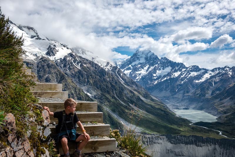 Nathan pauses on his Mt Cook hike up to the Sealy Tarns, Mount Cook, New Zealand