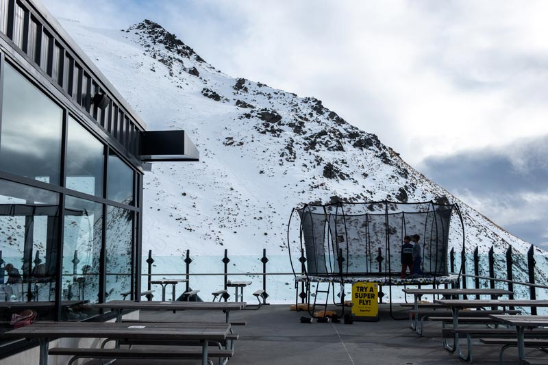 Outside deck area and trampoline at the Remarkables ski field restaurant and cafe area