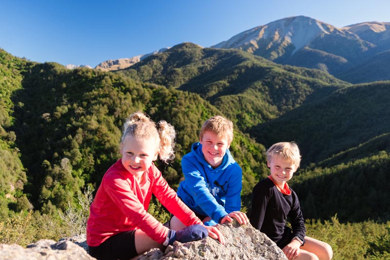 Kids on top of Dukes Knob on the hike to Pinnacles Hut