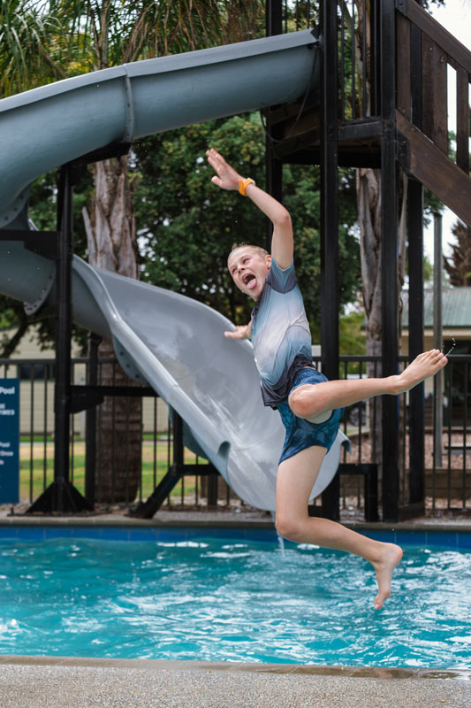 kids at the swimming pool at Motueka Top 10 Holiday Park